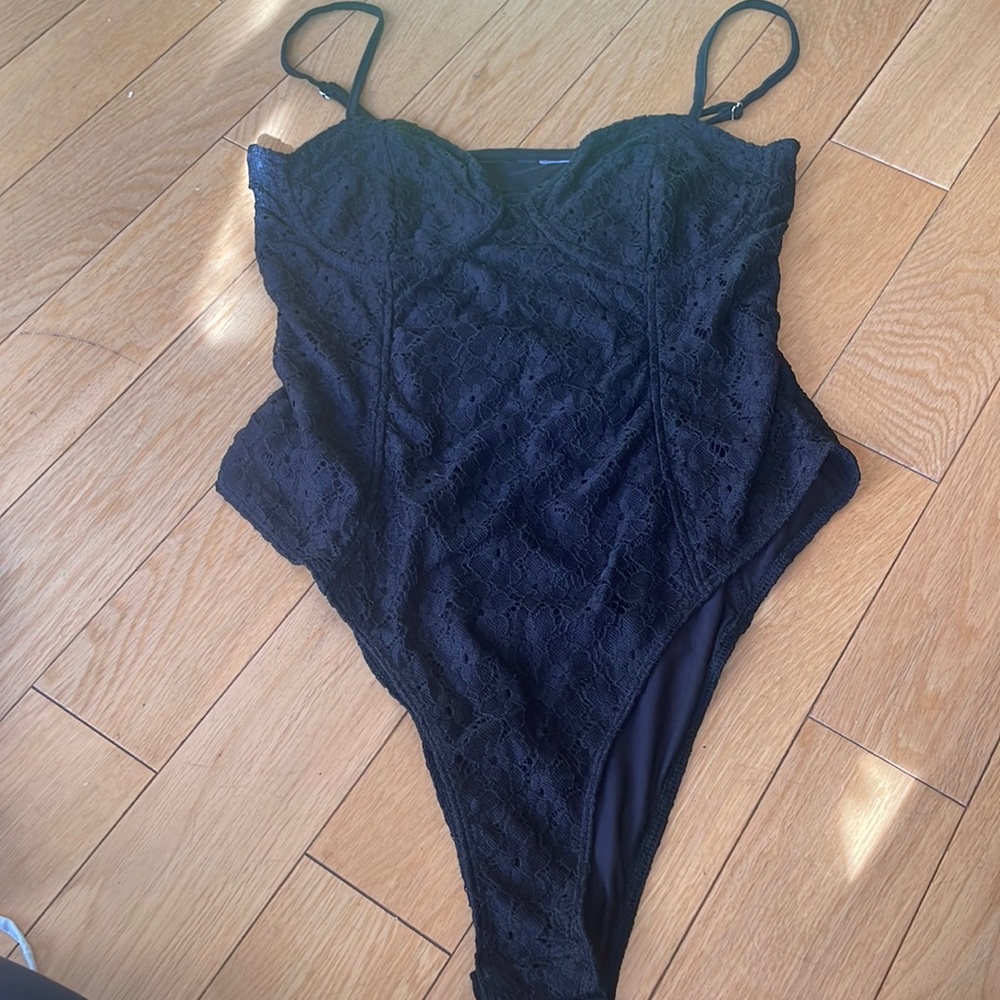 Lace corset style bodysuit. NWOT